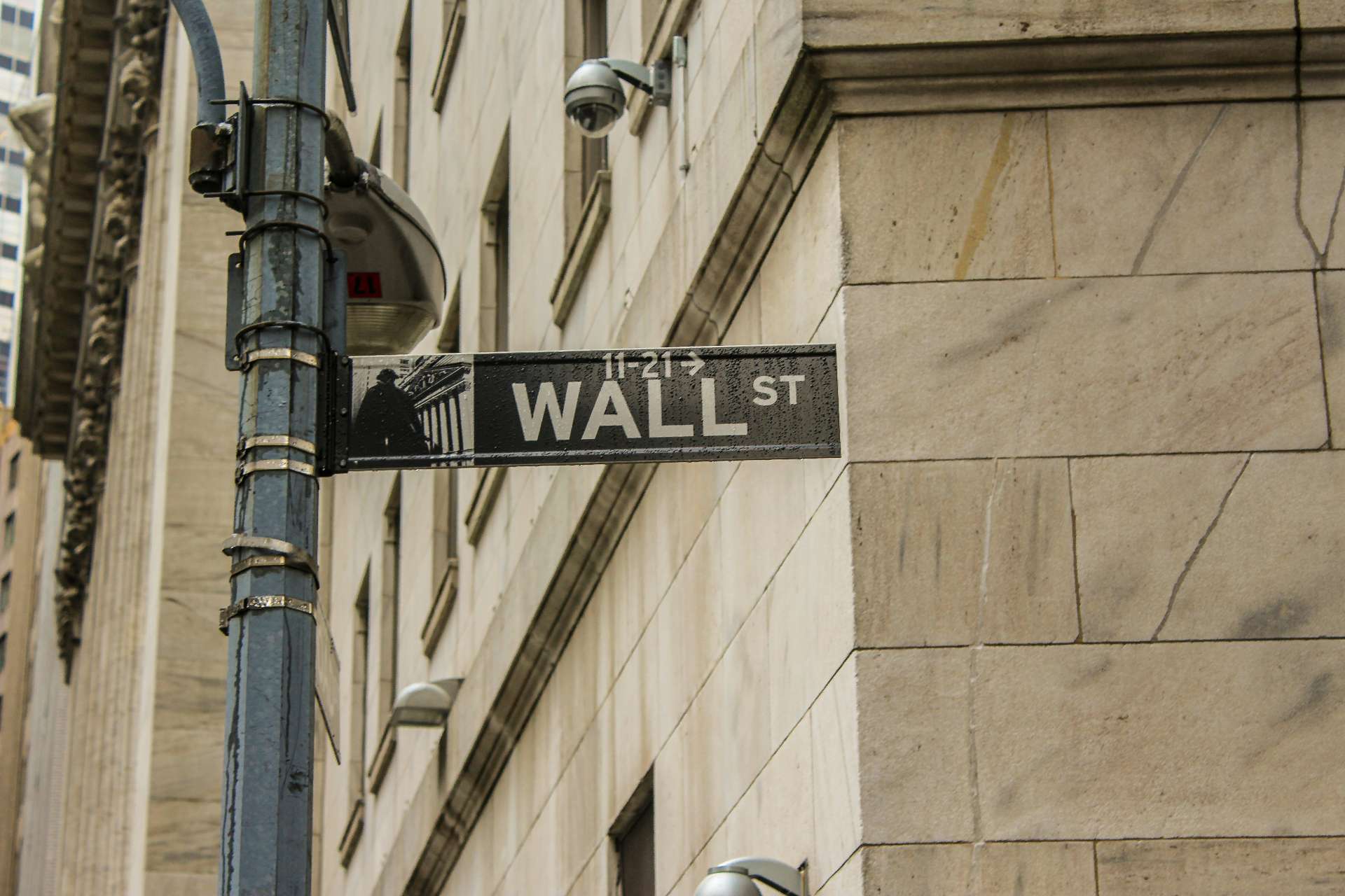 Financial analysis with investment charts and calculator representing EB-5 economic considerations