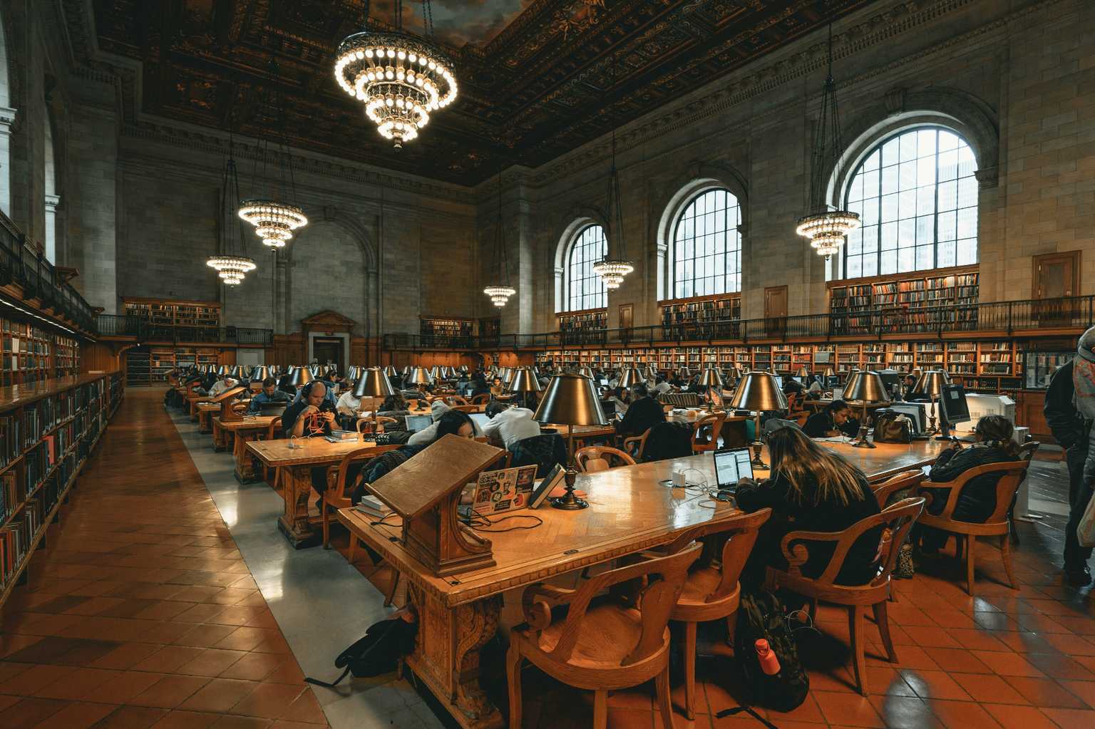 Grand library reading room representing elite academic institutions and educational opportunities for international students