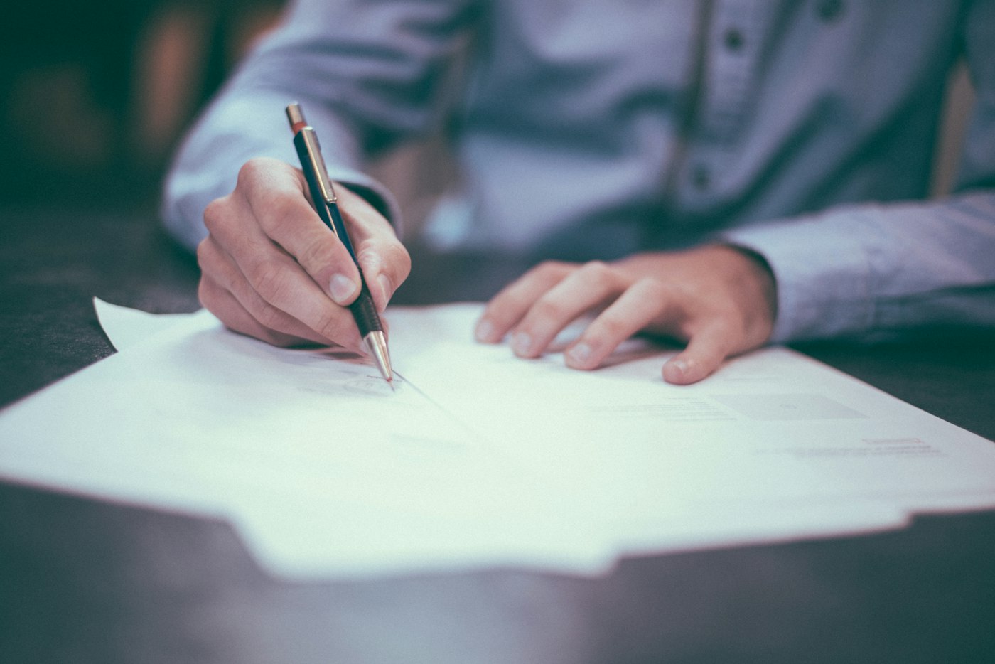 Immigration counsel reviewing petition documents before the January 1 2027 EB-5 amount change