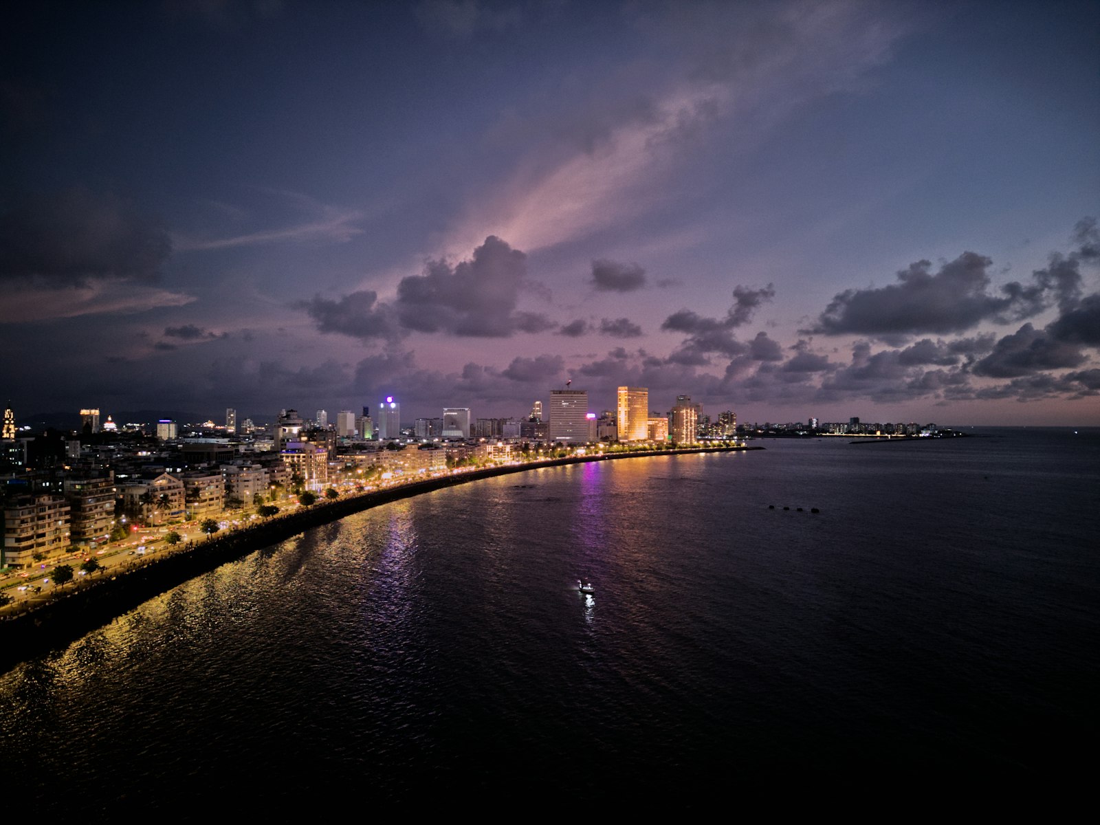 Mumbai Marine Drive waterfront and skyline at dusk