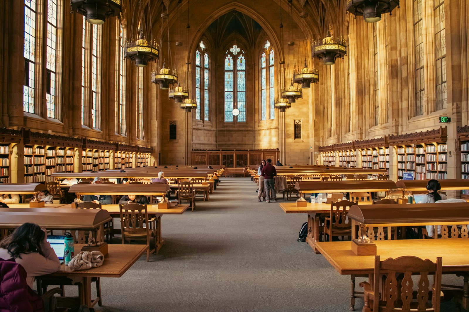 Reading room with high ceilings and bookshelves at Suzzallo Library, University of Washington