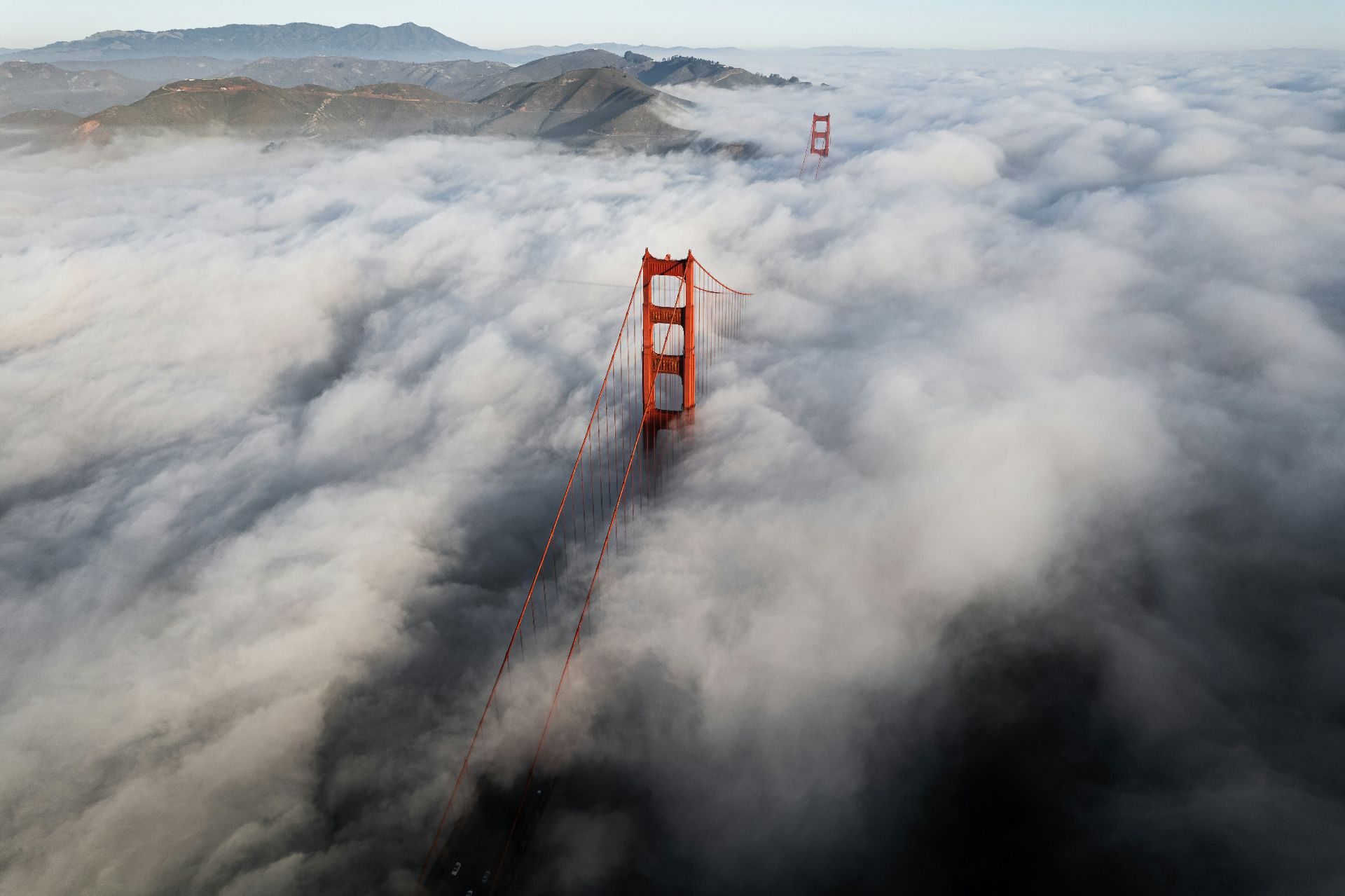 Golden Gate Bridge at sunset representing the pathway from H-1B to permanent residency